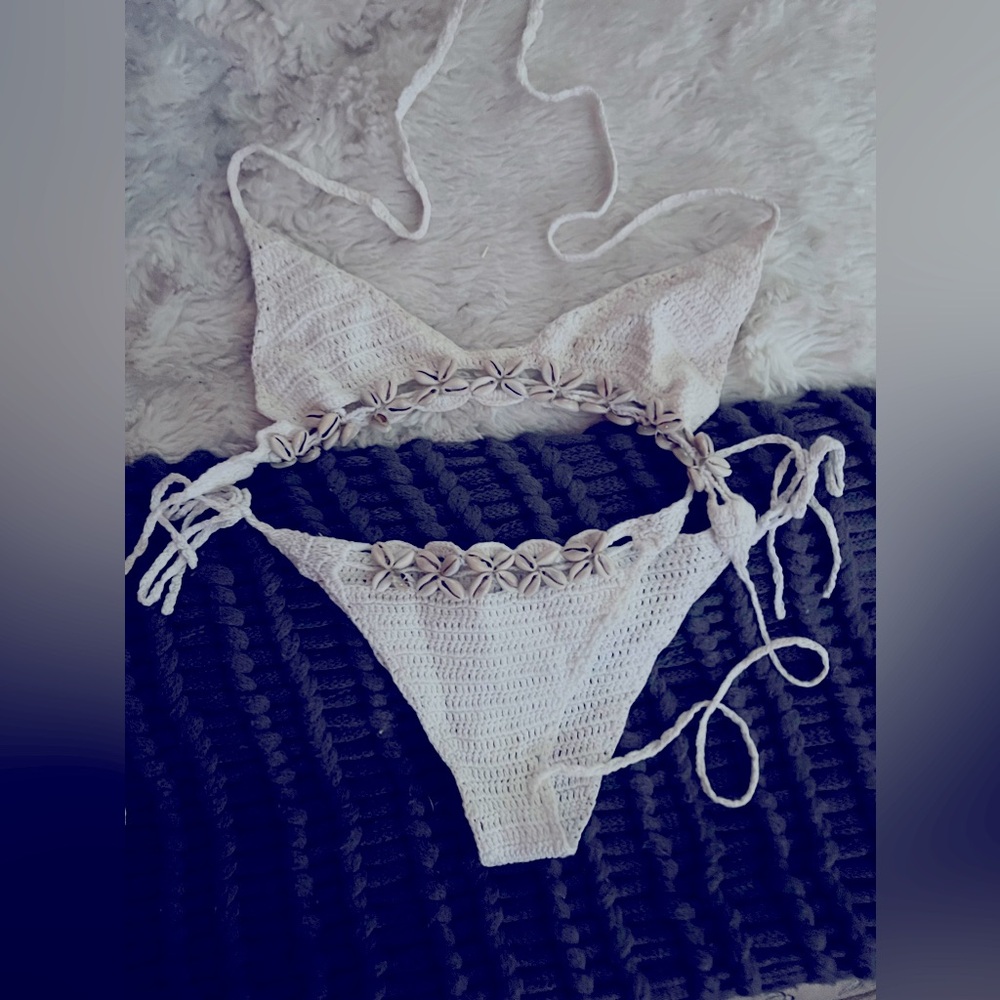 Adorable Crocheted bathing suit with seashells on the top and the bottoms